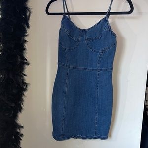 Super cute mini denim dress. Hugs all the curves perfectly
